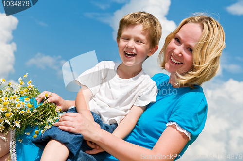 Image of laughing mother and son