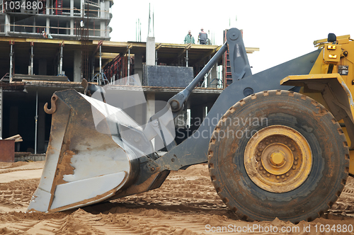 Image of construction earthmoving works with loader