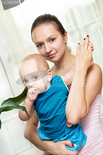 Image of Mother and child in her hands