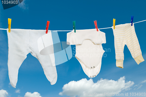 Image of chilld infant linen on a clothesline