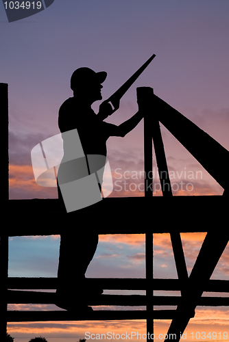 Image of builder at roofing works