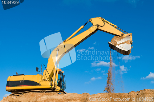 Image of track-type loader excavator at sand quarry