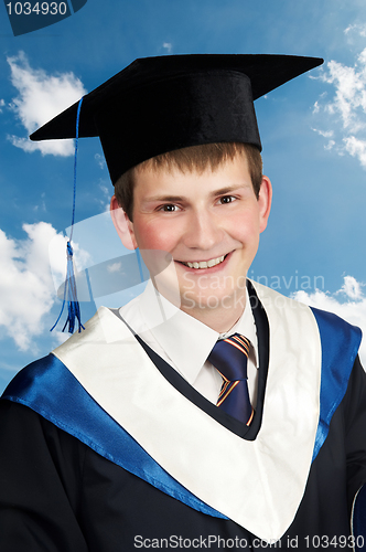 Image of happy smiley graduate boy