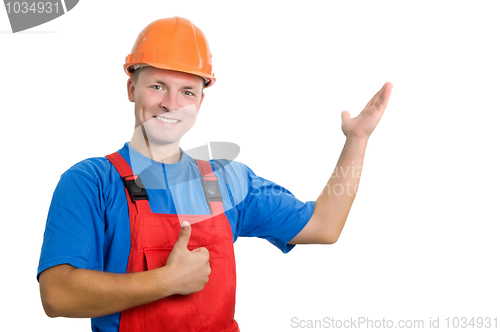 Image of builder in uniform pointing up