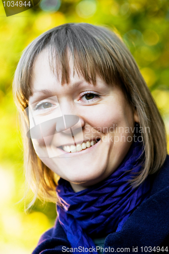 Image of Portrait of cheerful student outdoors