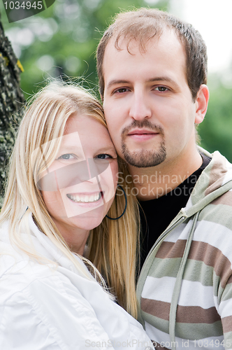 Image of Young happy couple outdoors