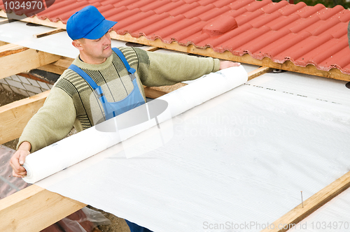 Image of roofing works with protective layer foil