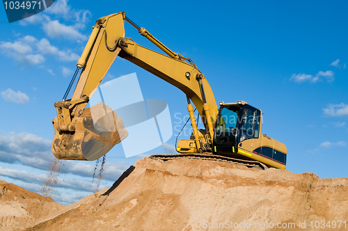 Image of track-type loader excavator at sand quarry