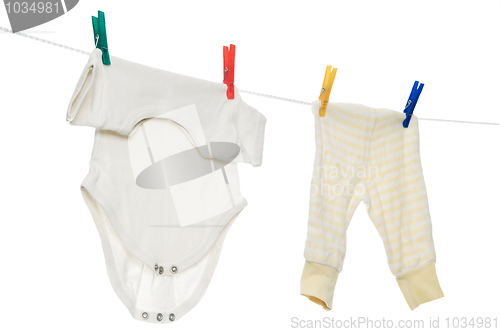 Image of chilld infant linen on a clothesline