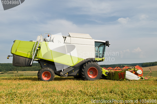 Image of harvesting combine