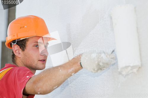 Image of builder facade painter at work