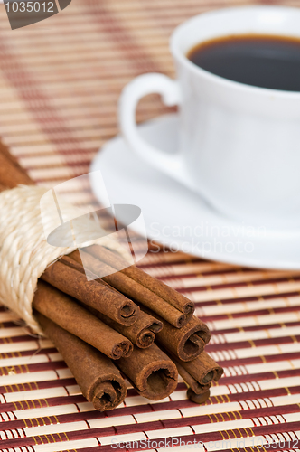 Image of cinnamon and cup of coffee
