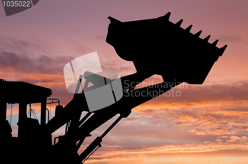 Image of loader shovel silhouette