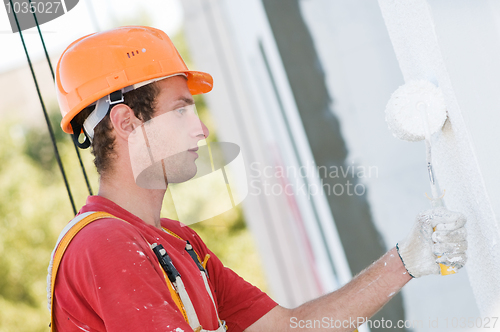 Image of builder facade painter at work