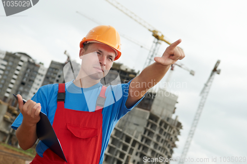 Image of builder worker with clipboard