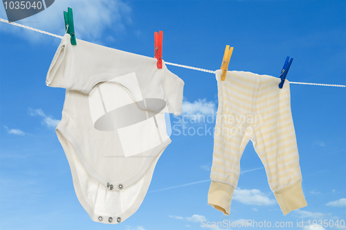 Image of chilld infant linen on a clothesline
