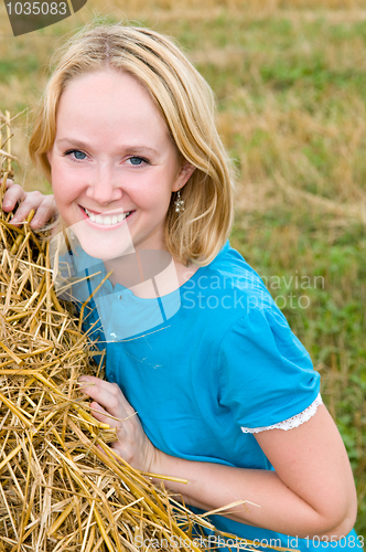 Image of young woman in a field 