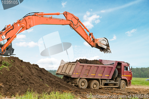 Image of excavator loader and dumper truck