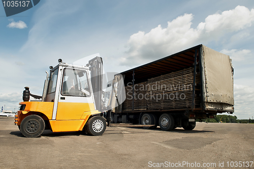 Image of forklift loader warehouse works