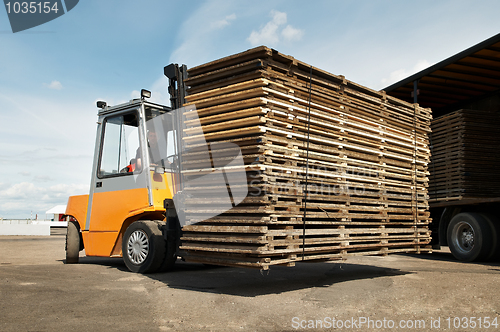 Image of forklift loader warehouse works