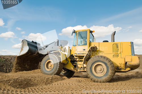 Image of wheel loader excavation working