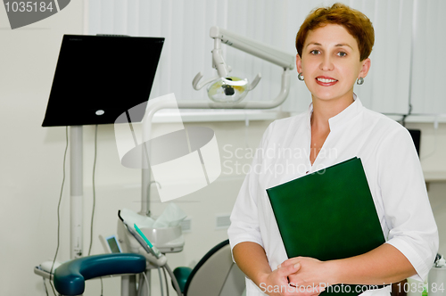 Image of Cheerful dentist at clinic