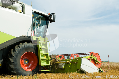 Image of close-up harvesting combine