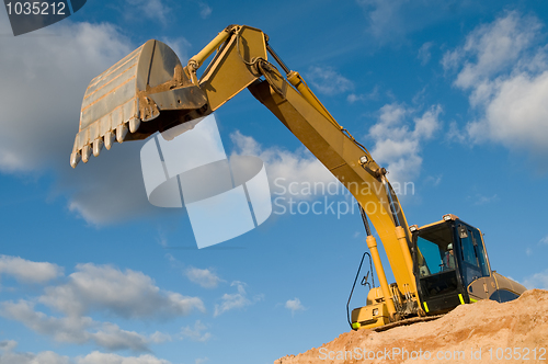 Image of track-type loader excavator at sand quarry