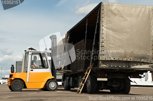 Image of forklift loader warehouse works