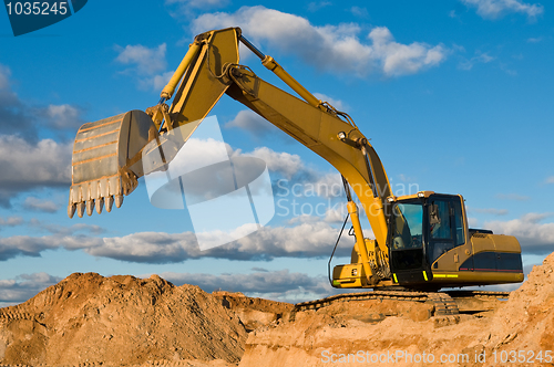 Image of track-type loader excavator at sand quarry