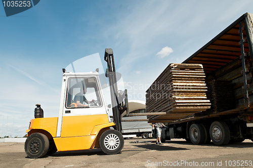 Image of forklift loader warehouse works