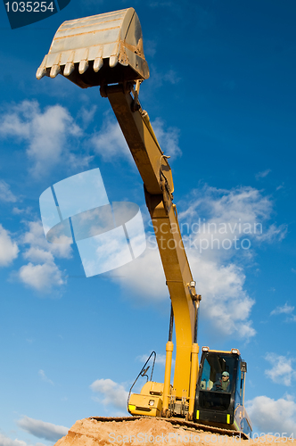 Image of track-type loader excavator at sand quarry