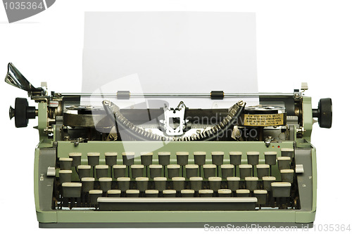 Image of Retro typewriter with blank paper