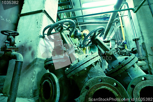 Image of Industrial zone, Steel pipelines in blue tones  