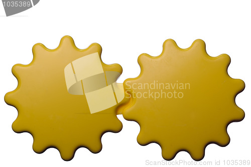 Image of Yellow interlocking gears