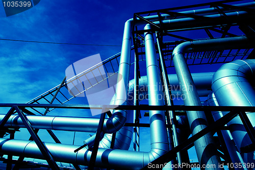 Image of Industrial zone, Steel pipelines in blue tones  