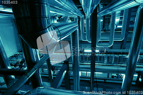 Image of Industrial zone, Steel pipelines in blue tones  