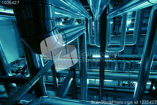 Image of Industrial zone, Steel pipelines in blue tones  