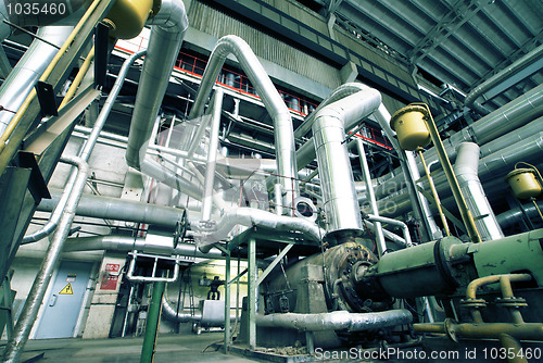 Image of Equipment, cables and piping as found inside of a modern industr