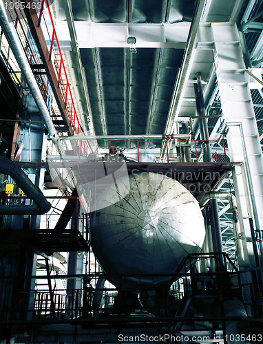 Image of Equipment, cables and piping as found inside of a modern industr