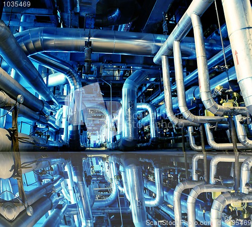 Image of Industrial zone, Steel pipelines in blue tones with reflection