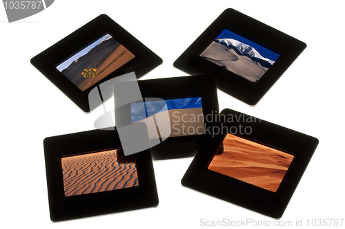 Image of sand dunes - color slides on a lightbox