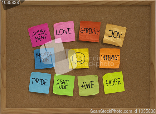 Image of smiley and ten positive emotions on bulletin board