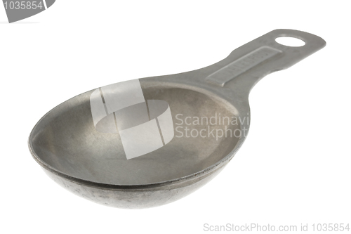 Image of empty aluminum measuring tablespoon