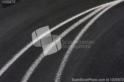 Image of converging lines on blackboard