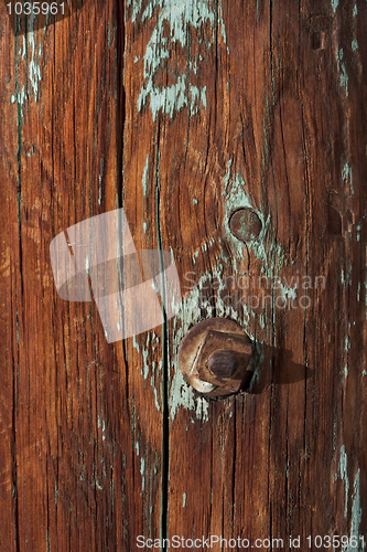 Image of weathered wood of old barn post