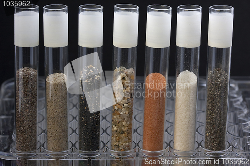 Image of sand in laboratory testing tubes
