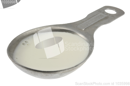 Image of tablespoon of milk or creamer