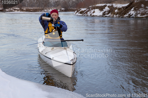 Image of winter canoe - break for hot tea