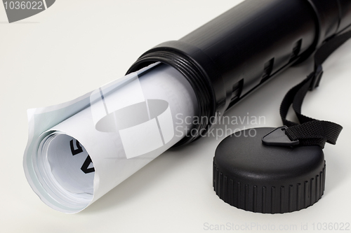 Image of poster in a black plastic tube